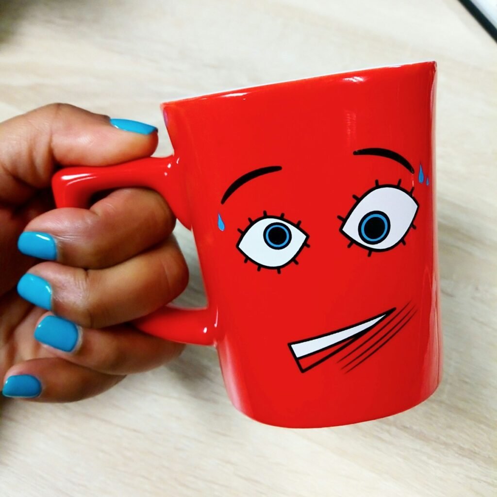 red ceramic mug